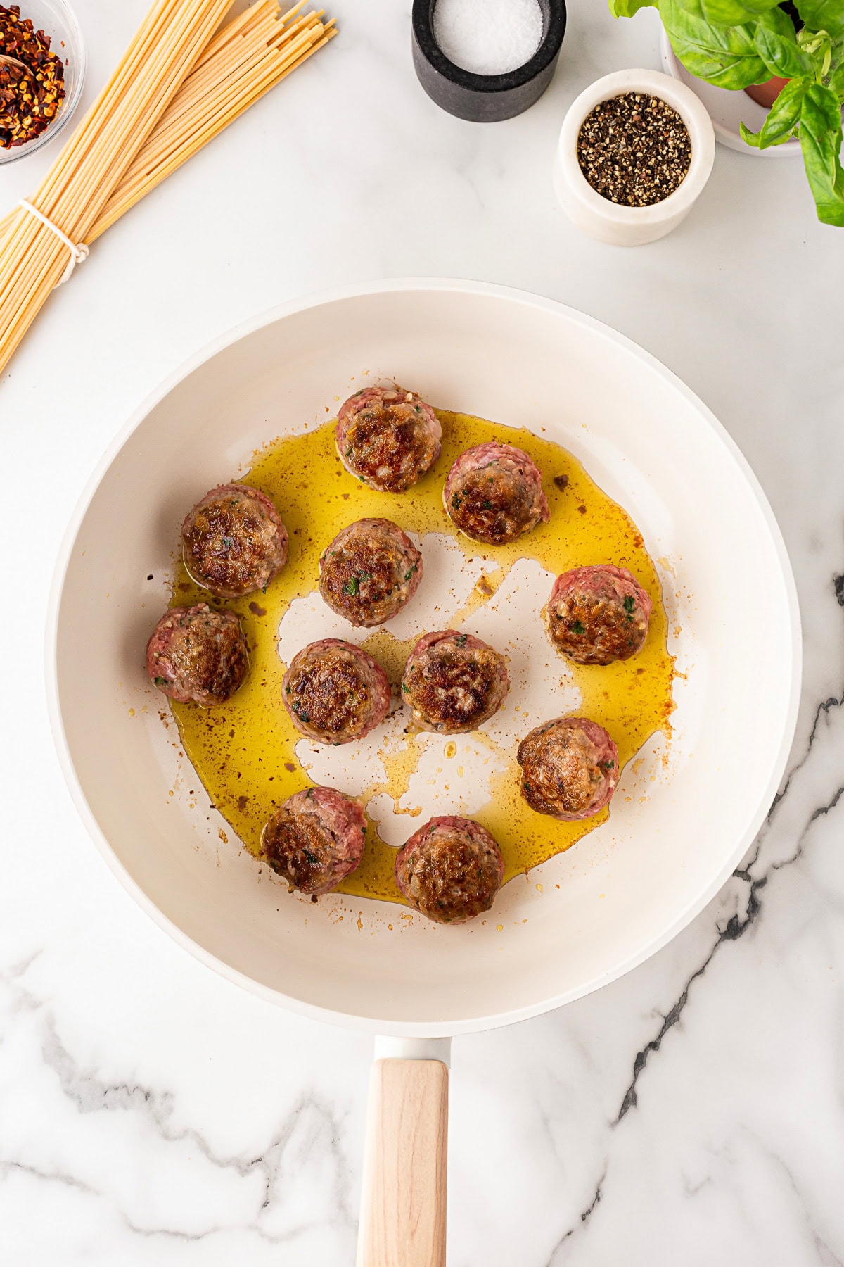 Frying meatballs. 