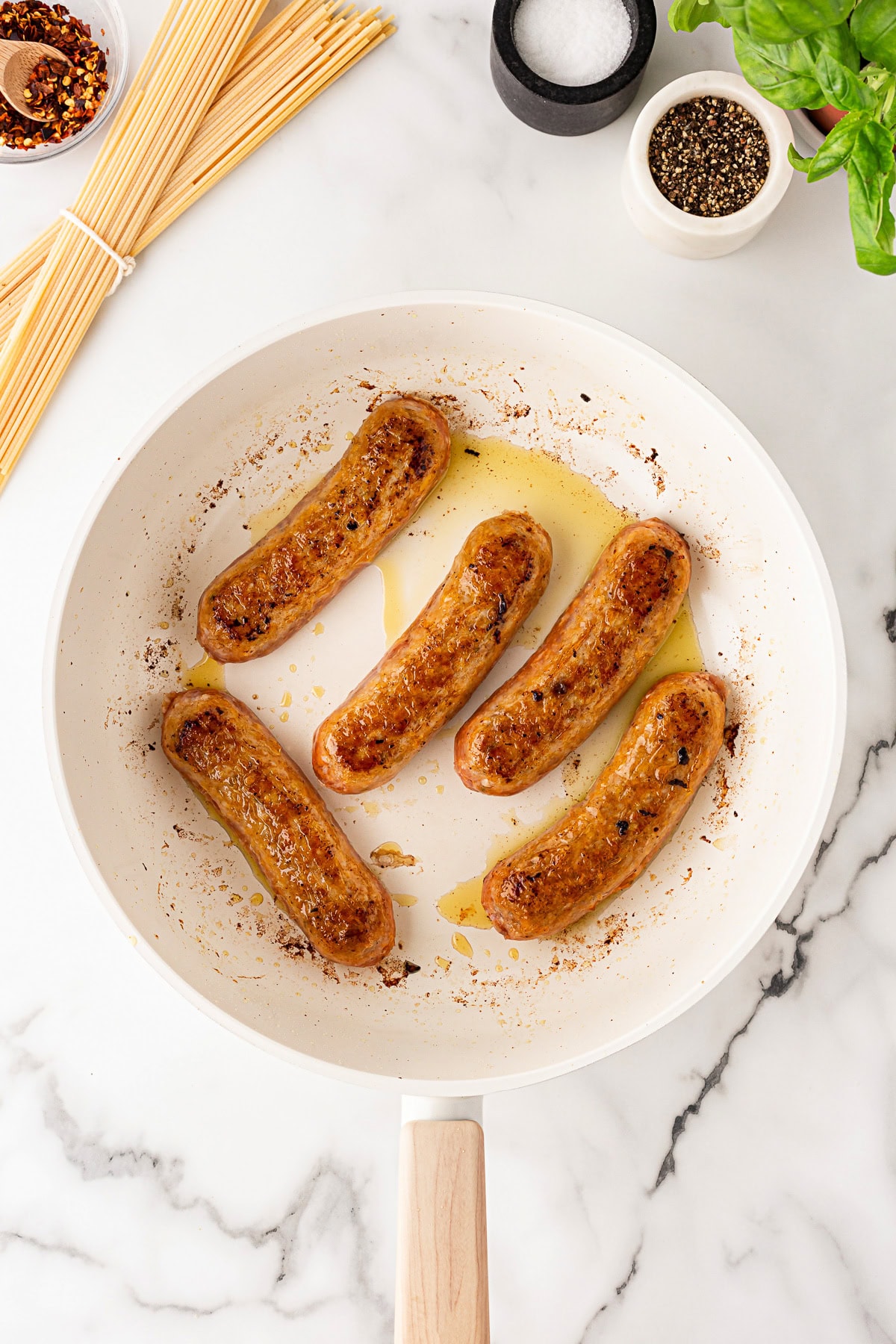 Sausage added to fry. 