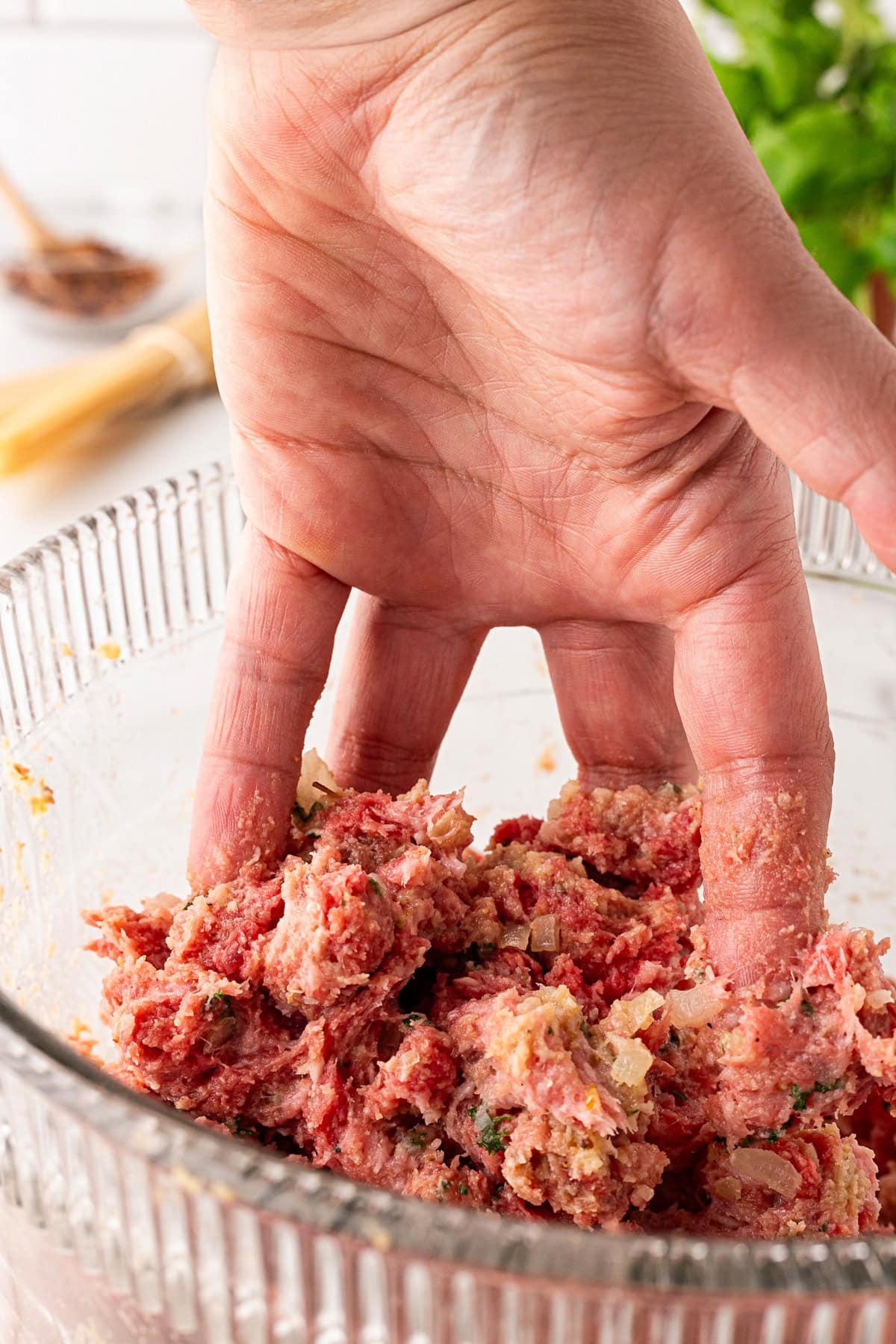Close-up of hand as a pitchfork. 