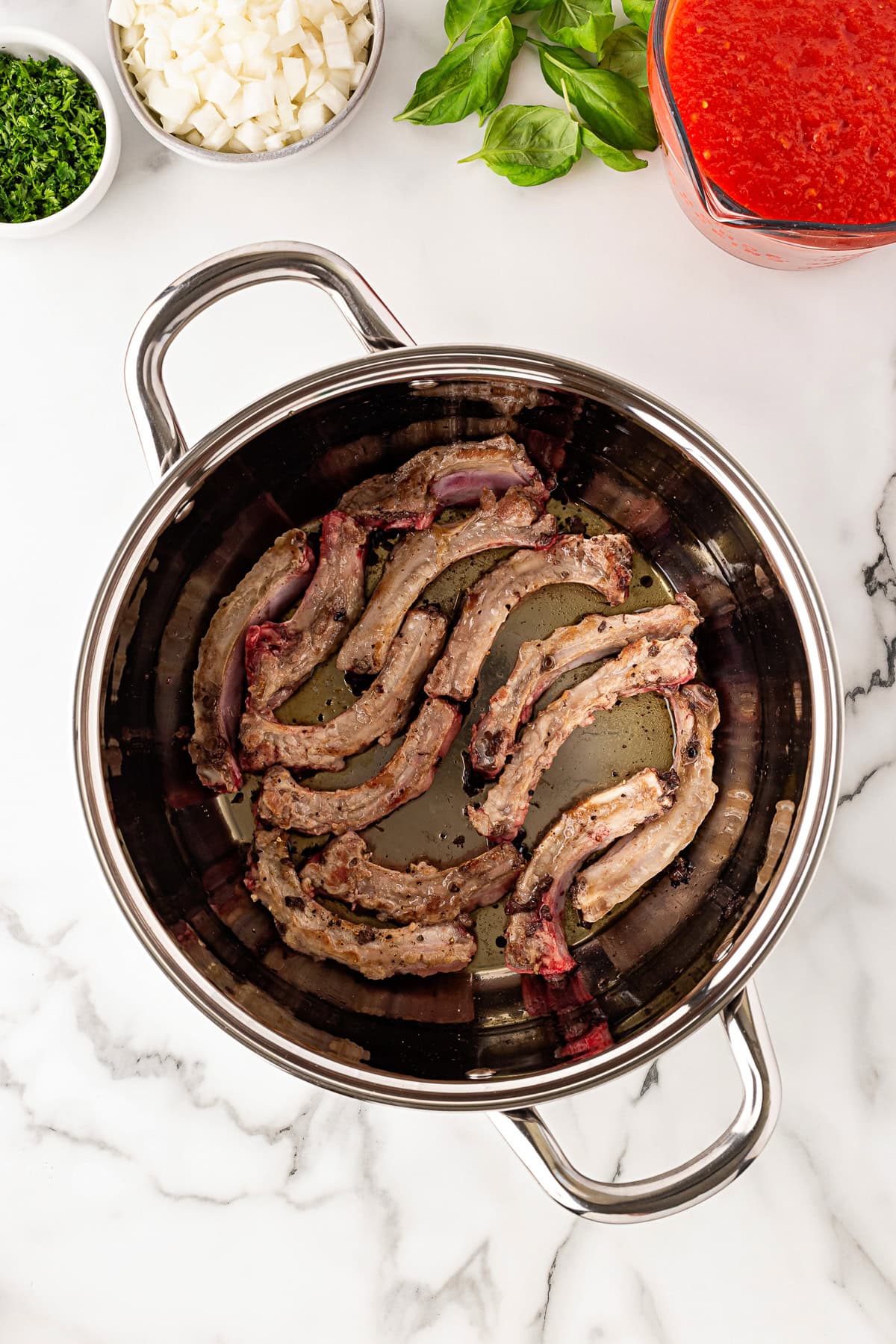 Frying up ribs. 