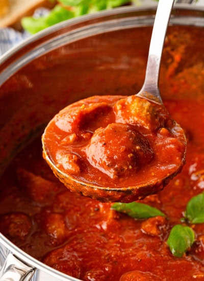 Large spoonful of sauce.