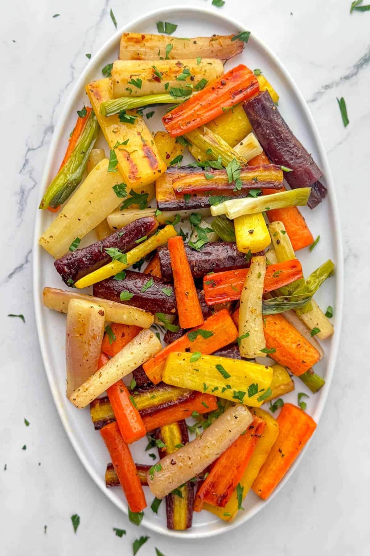 Rainbow carrots on a serving platter.