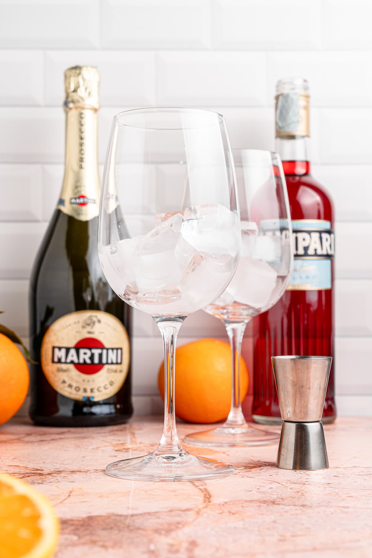 Tall stemmed glass with ice. 