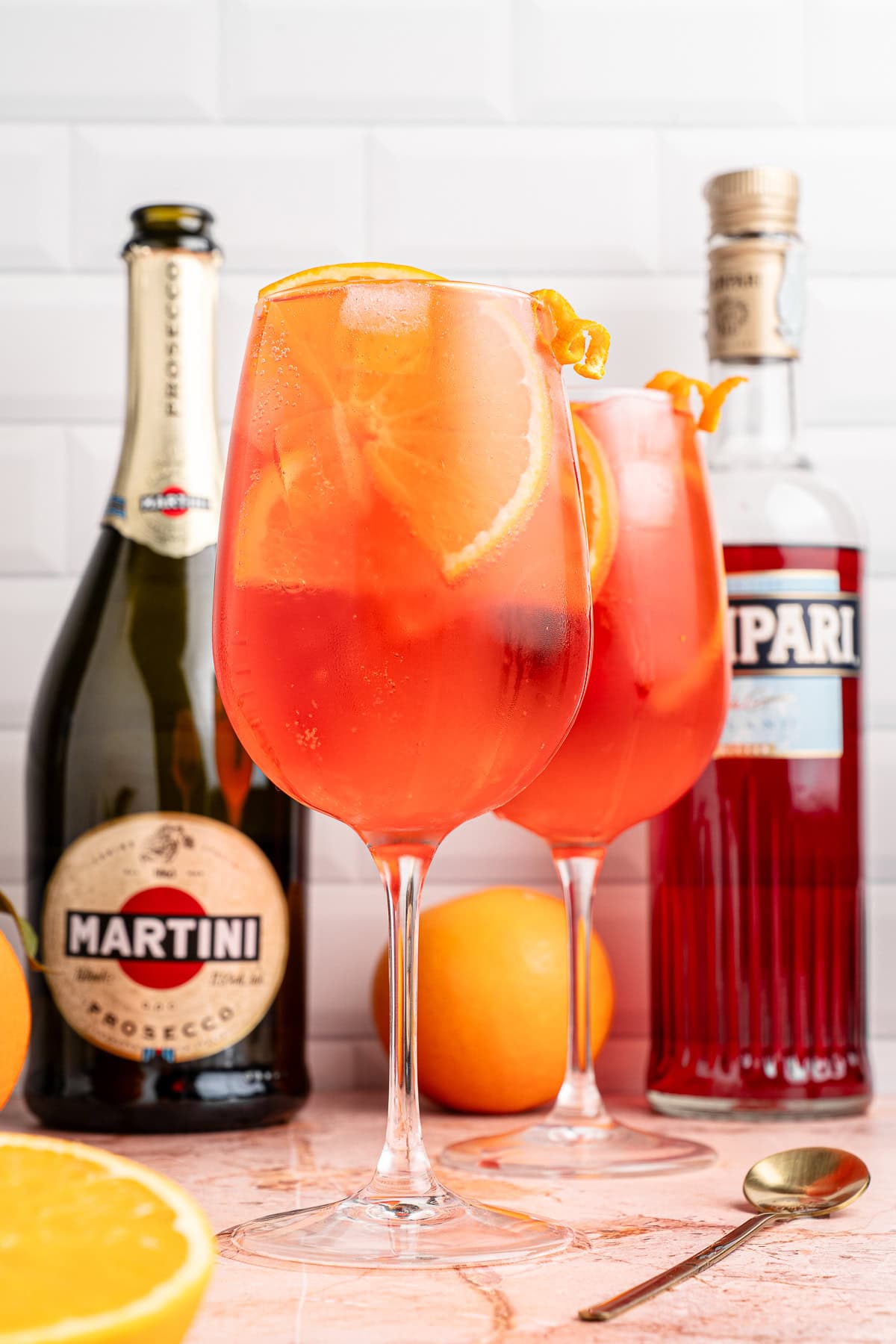Orange slices added to the Campari Spritz. 