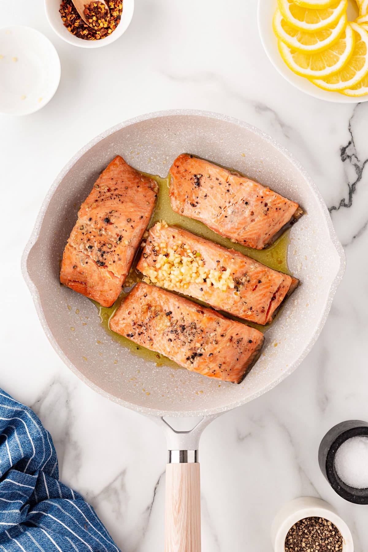 Flesh side up and garlic added. 