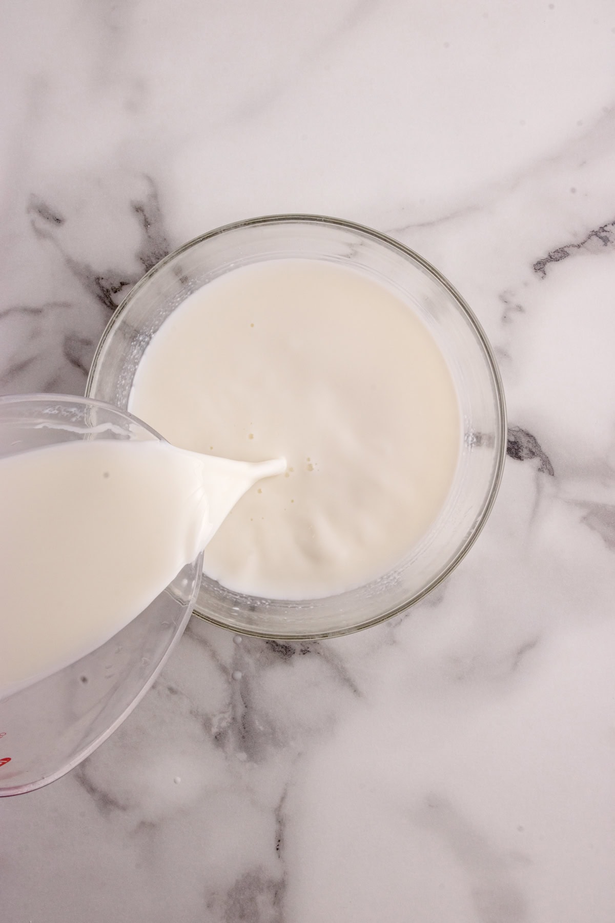 Adding milk.