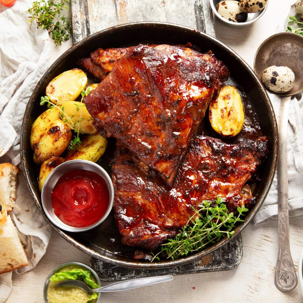 Overhead of ribs and potatoes. 