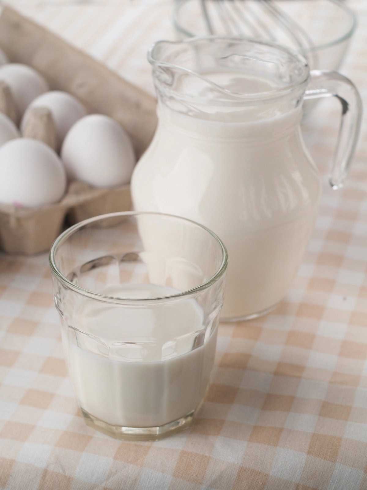 Buttermilk in glass and pitcher.