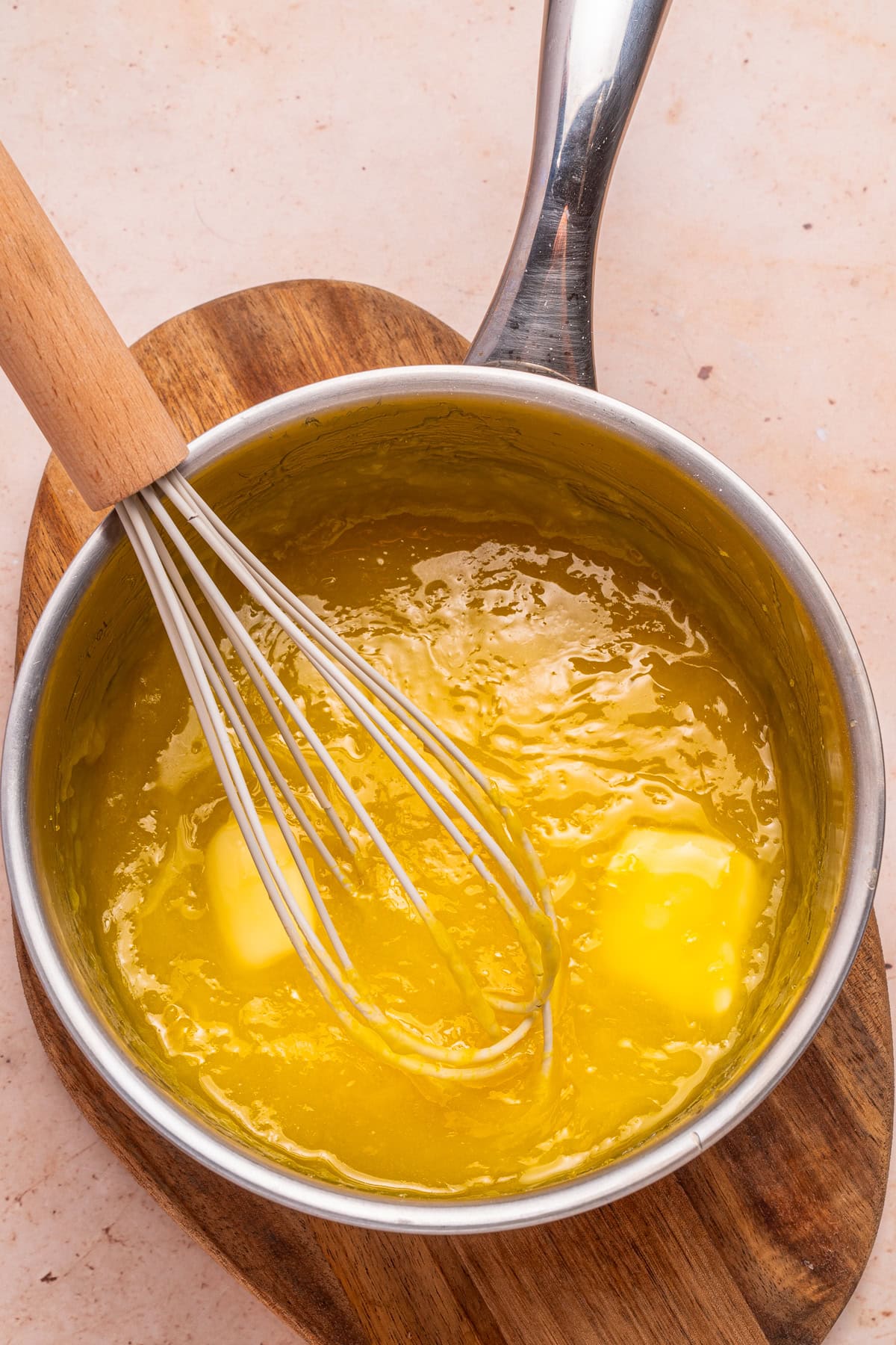 Mixing in butter.