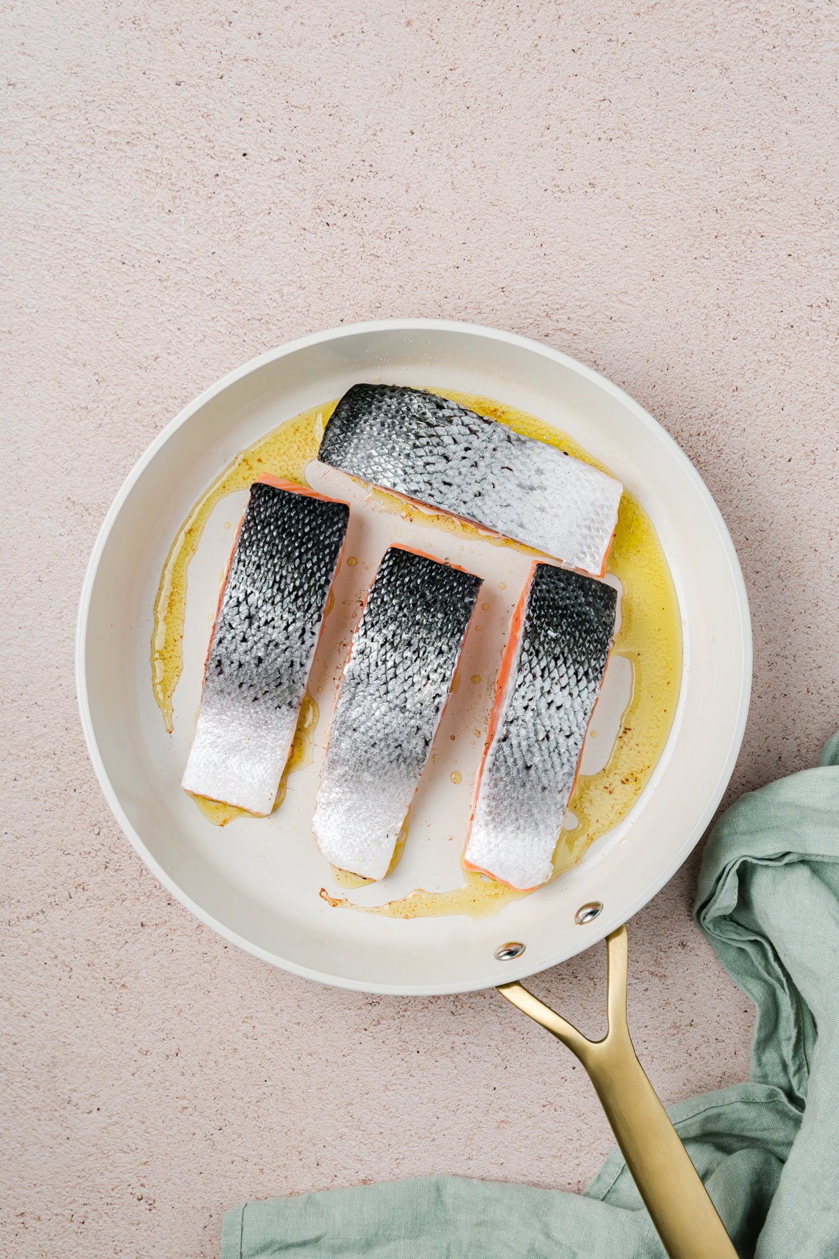 Salmon skin up in pan. 