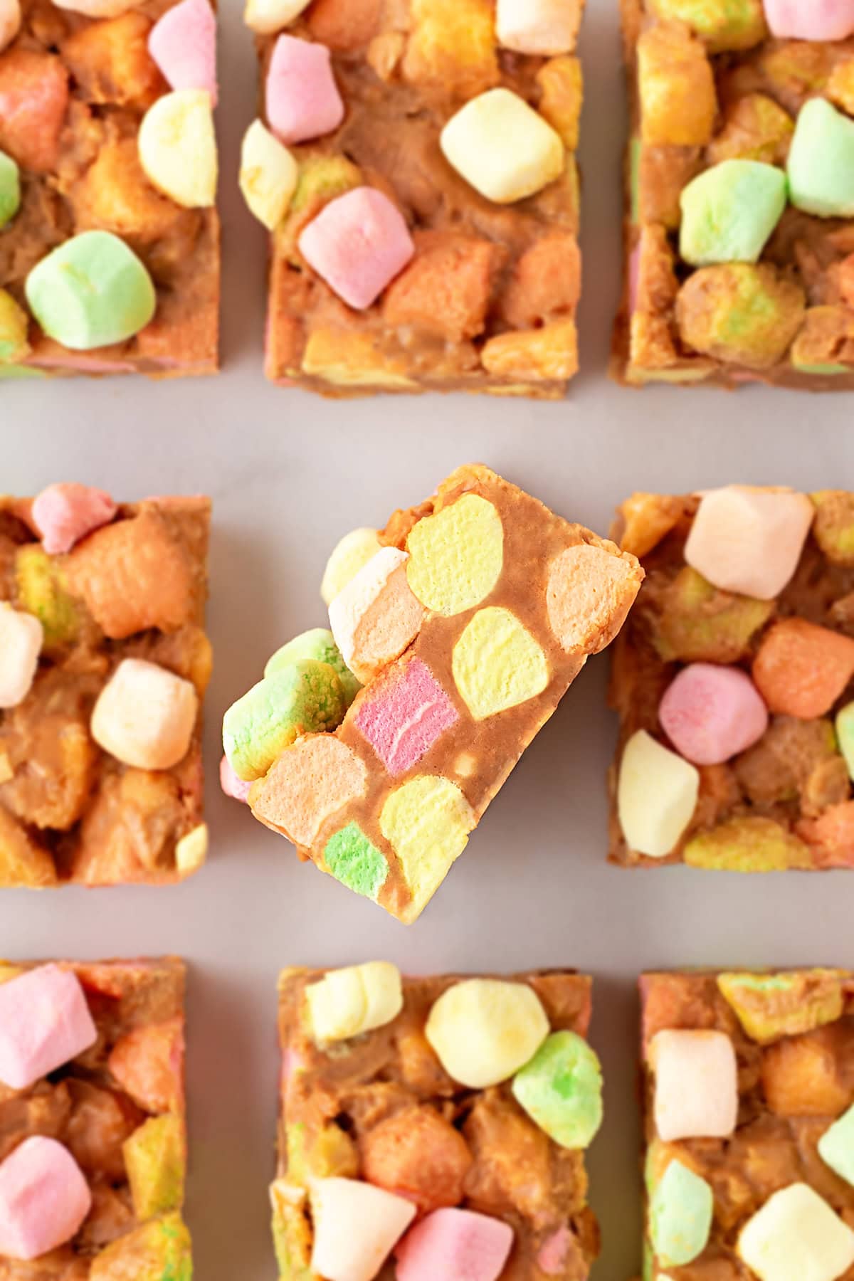 Peanut Butter Marshmallow Squares with one on its side. 