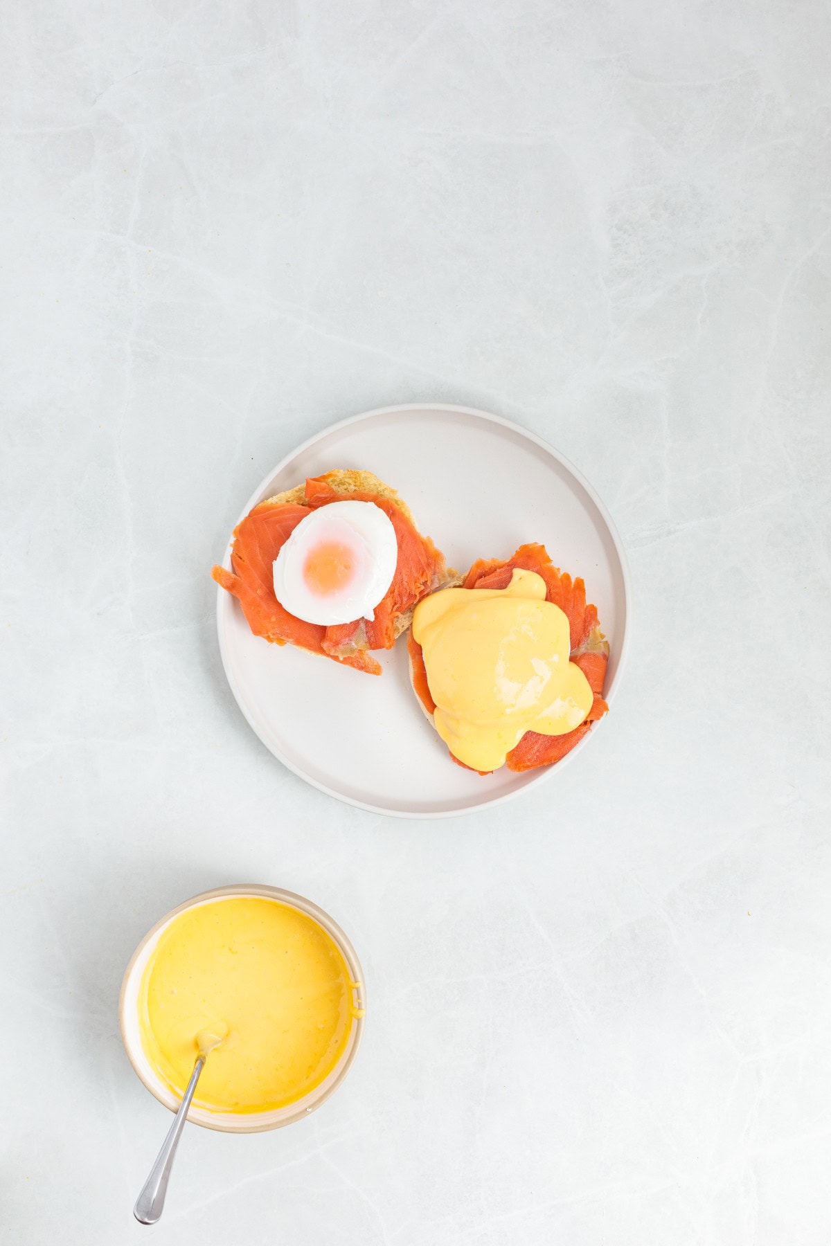 Adding hollandaise. 