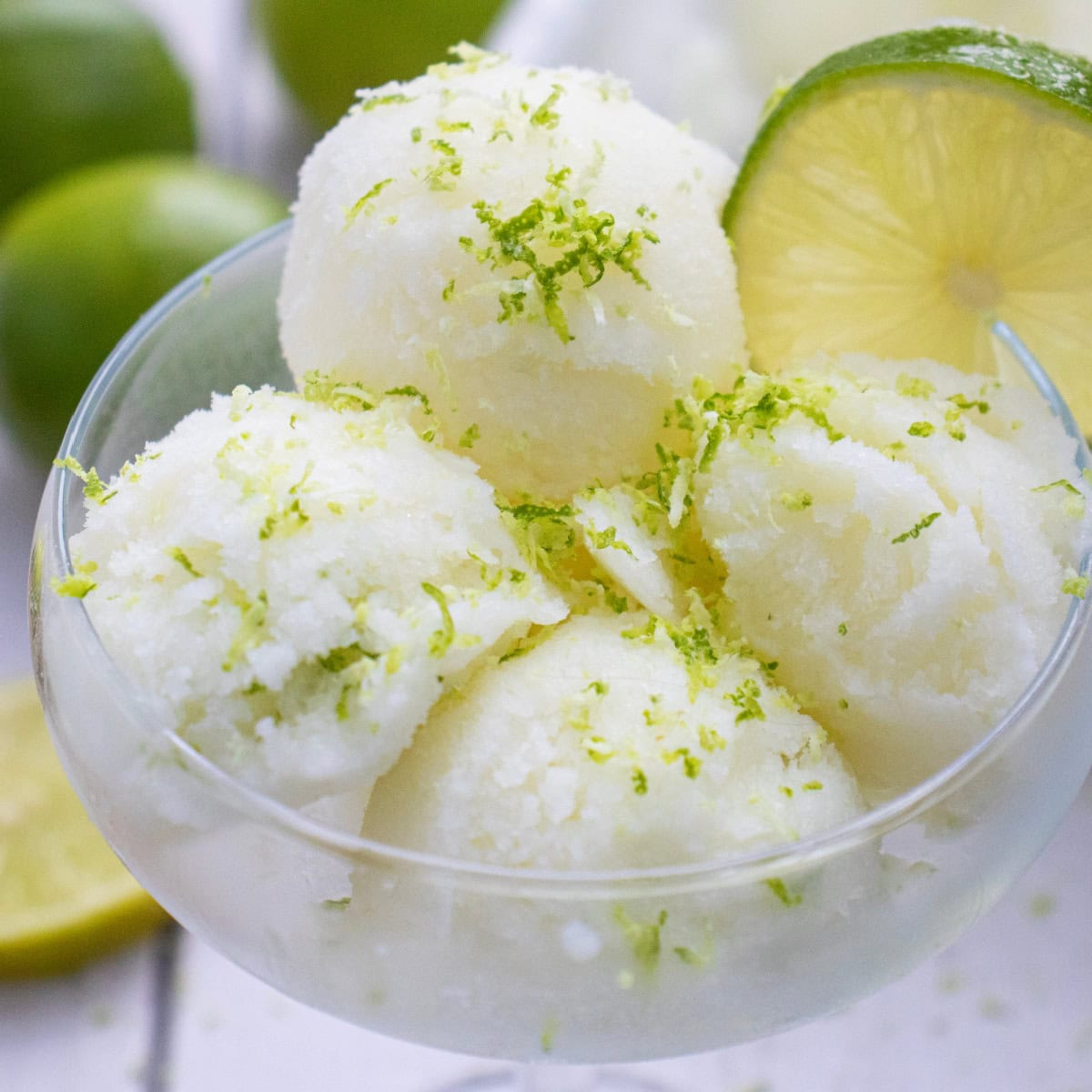 Close up of Homemade Lime Sherbet scooped in a glass.