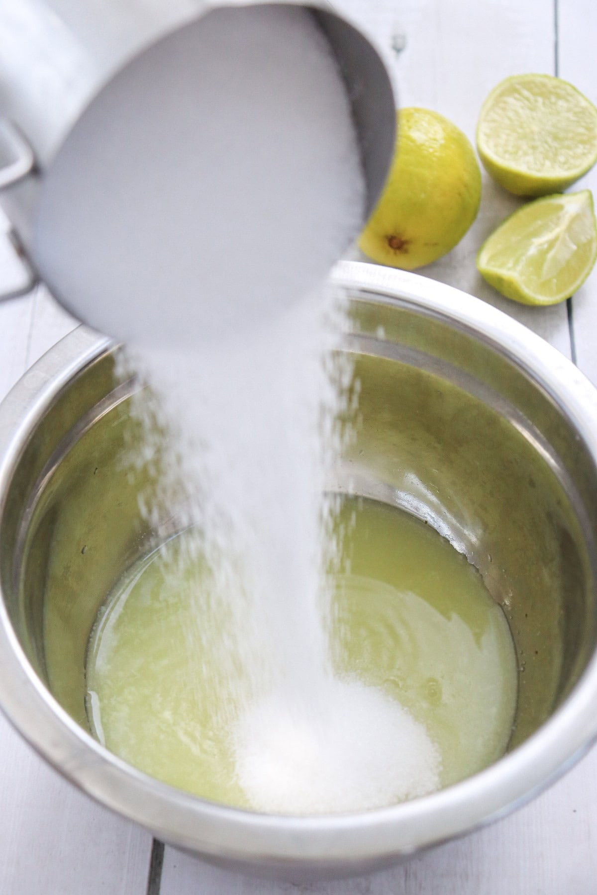 Adding sugar.