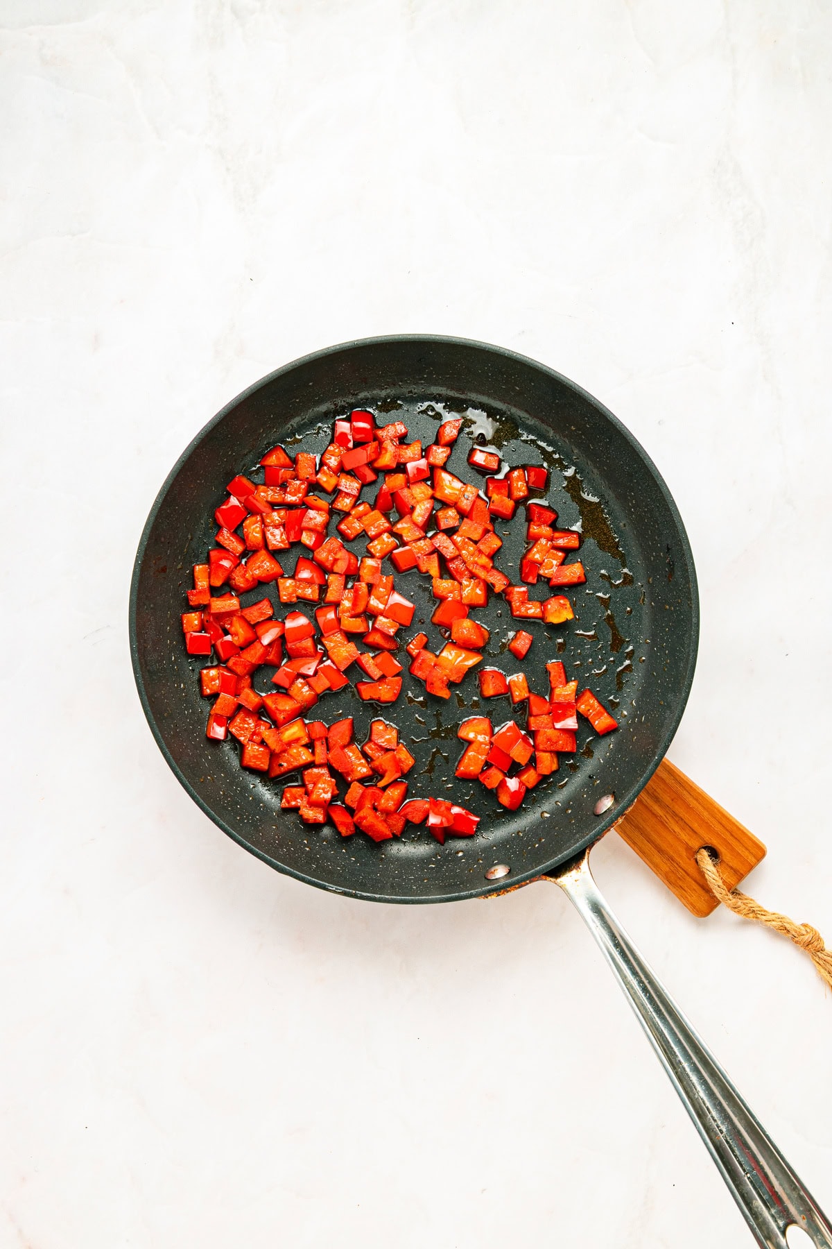 Searing sweet bell pepper.