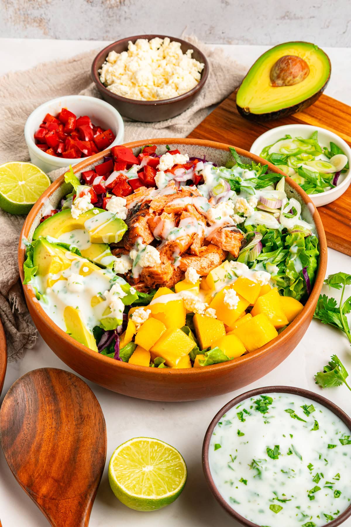 Salmon Cobb Salad finished with ingredients. 