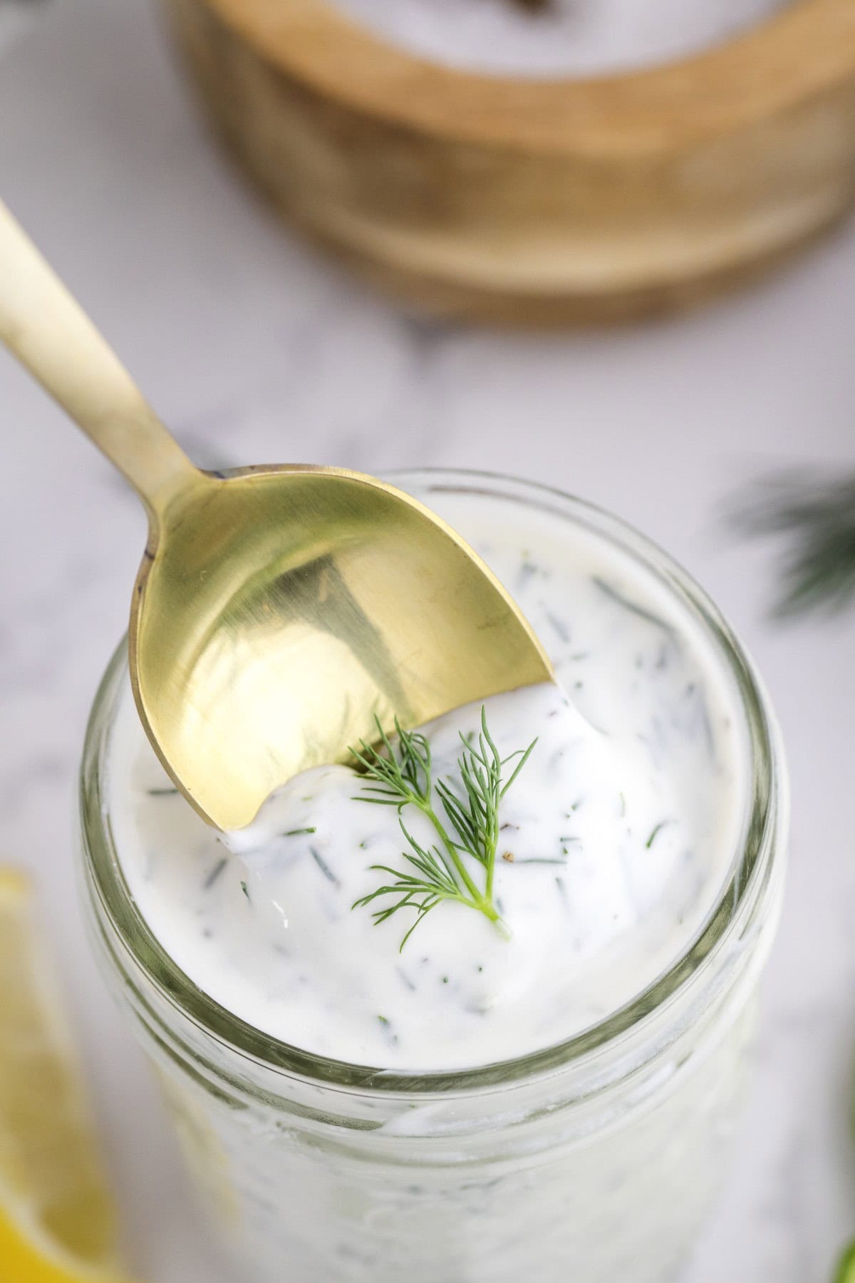 Taking a spoonful of Yogurt Dill Dressing. 