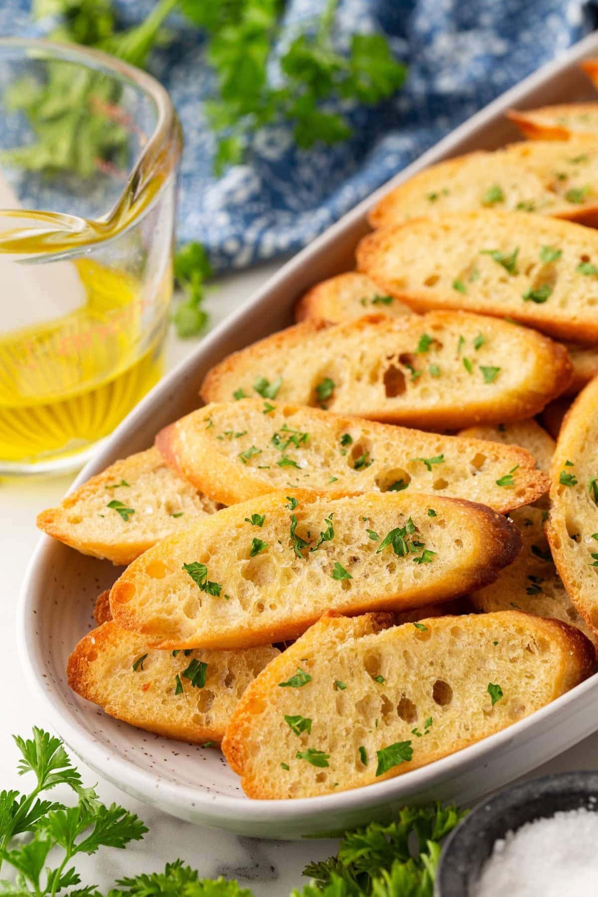 Crostini in a white serving platter.