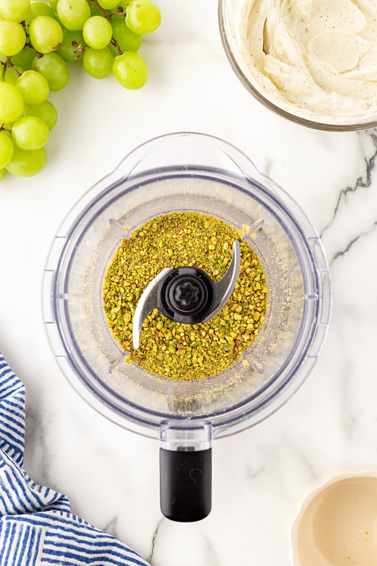 Chopping nuts in a food processor. 