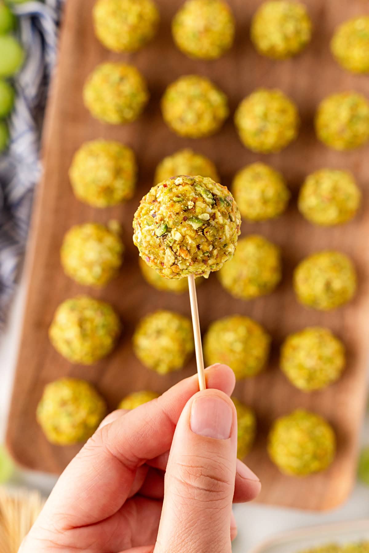 Up close to a ball on a toothpick. 