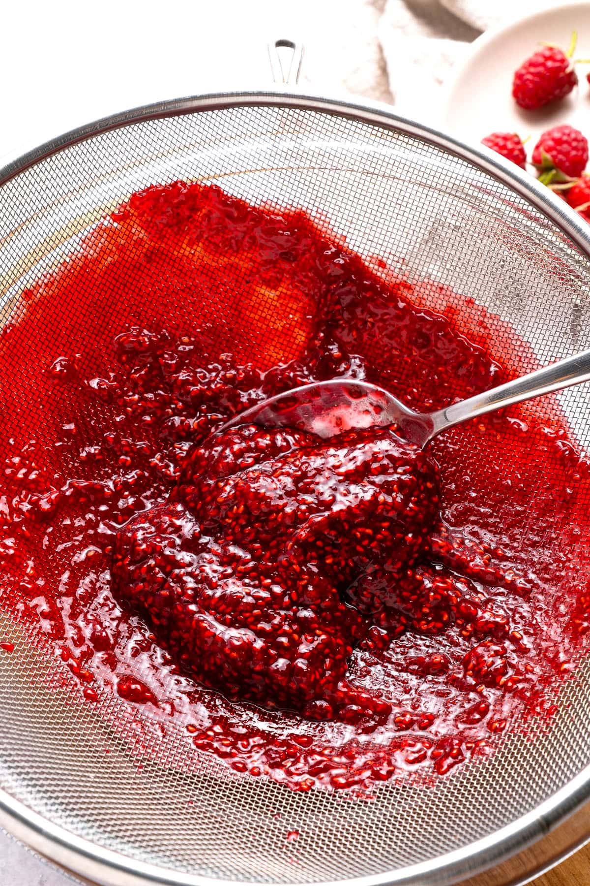 Straining the sauce.