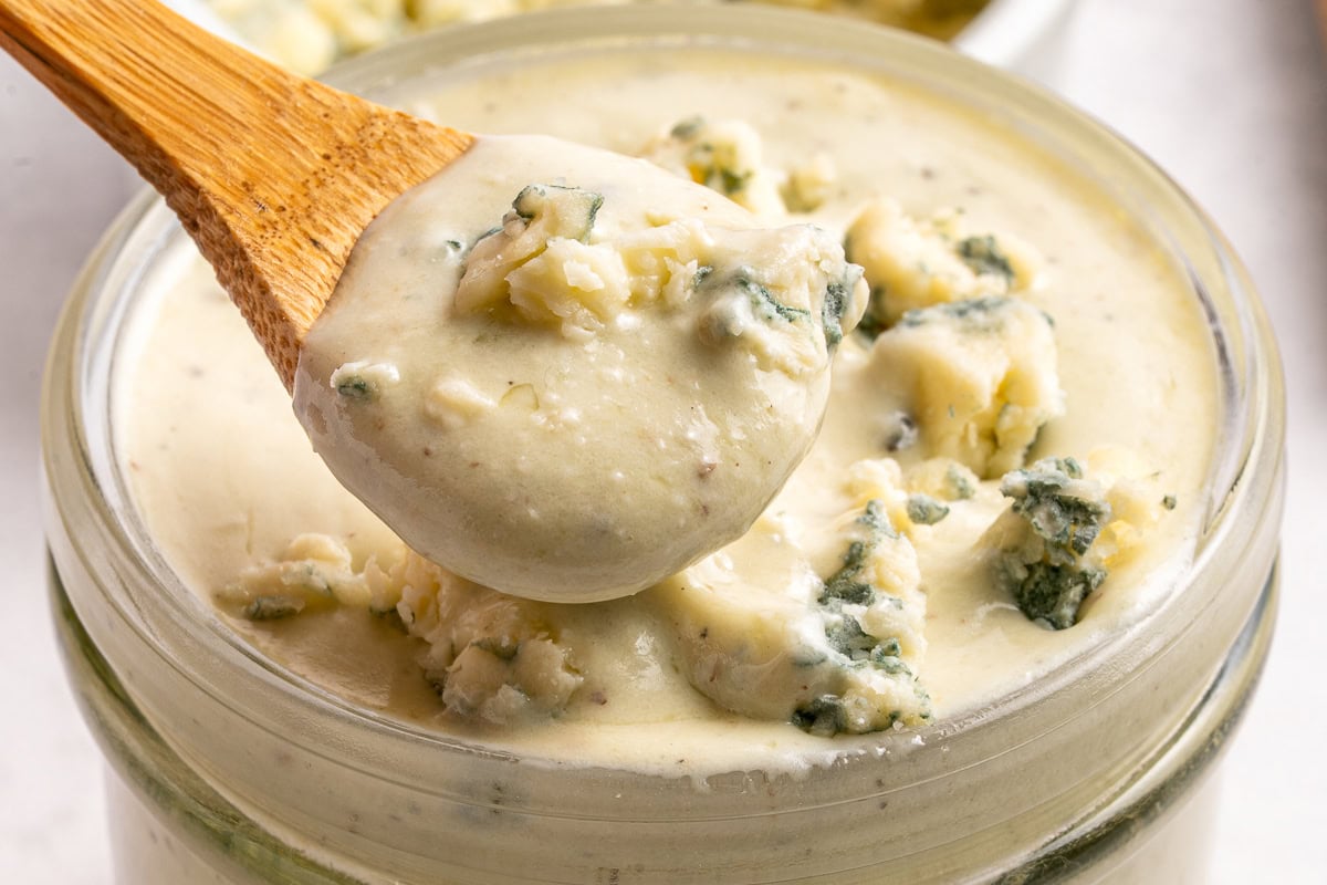 Blue cheese dressing on a spoon.