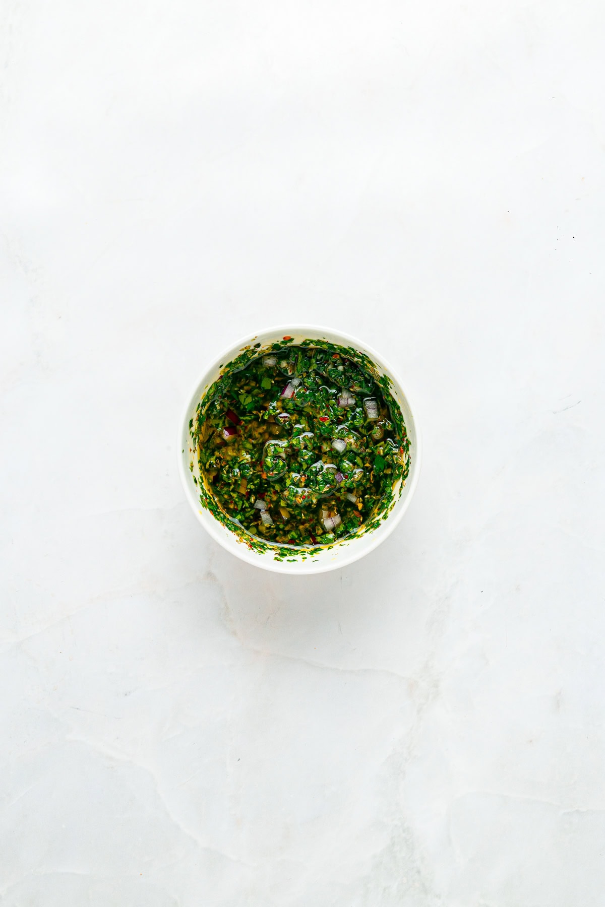 Chimichurri sauce in a bowl.