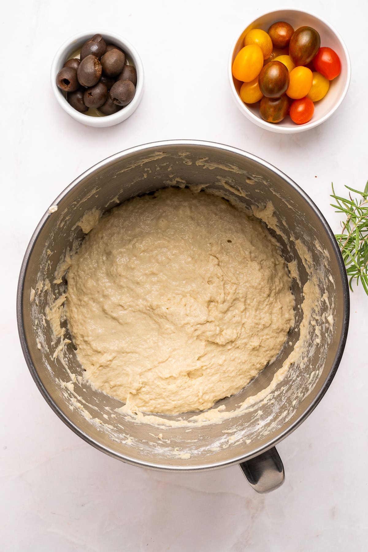 Combining dough ingredients.