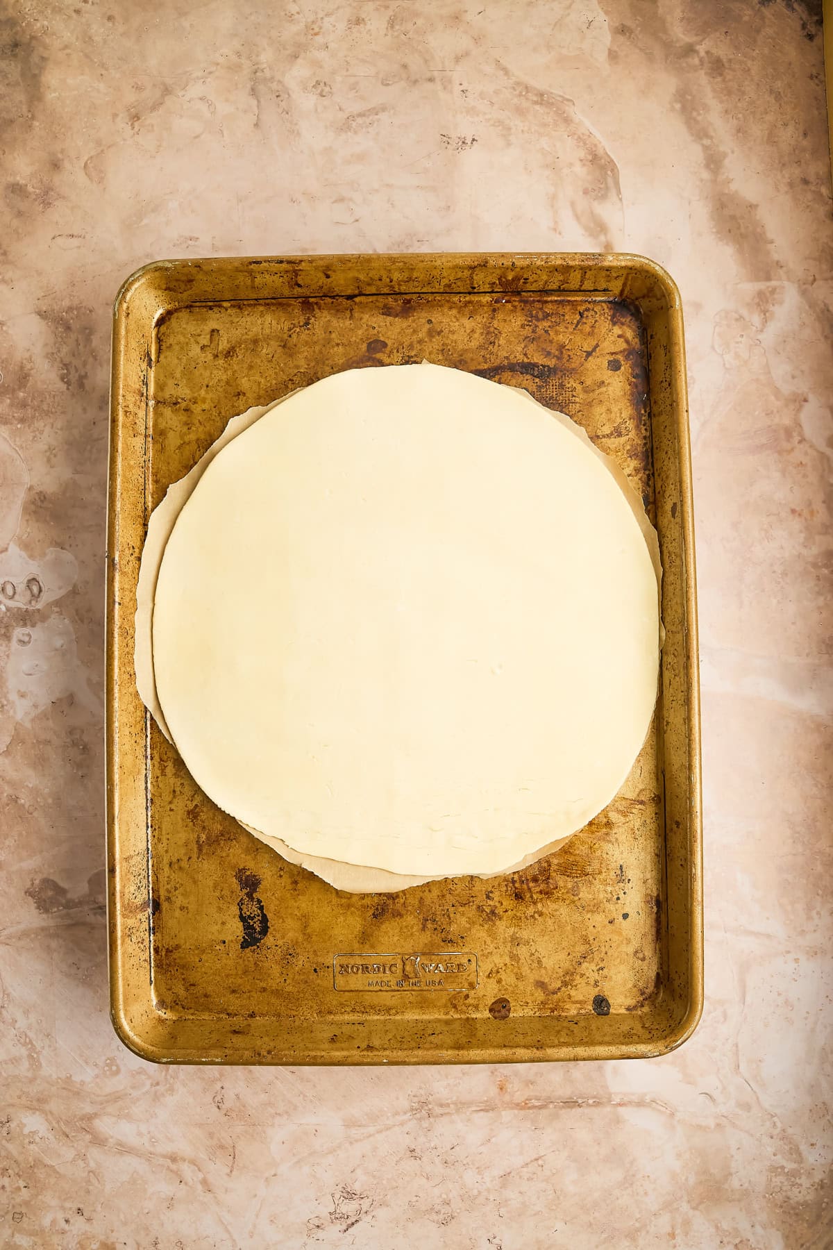 Pie crust on baking sheet.