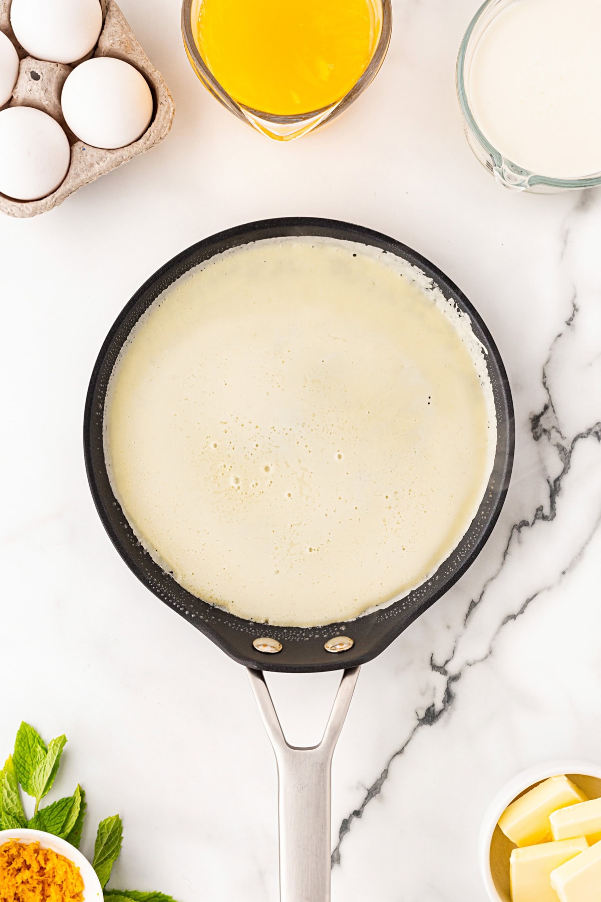 Finished crepe in a pan.