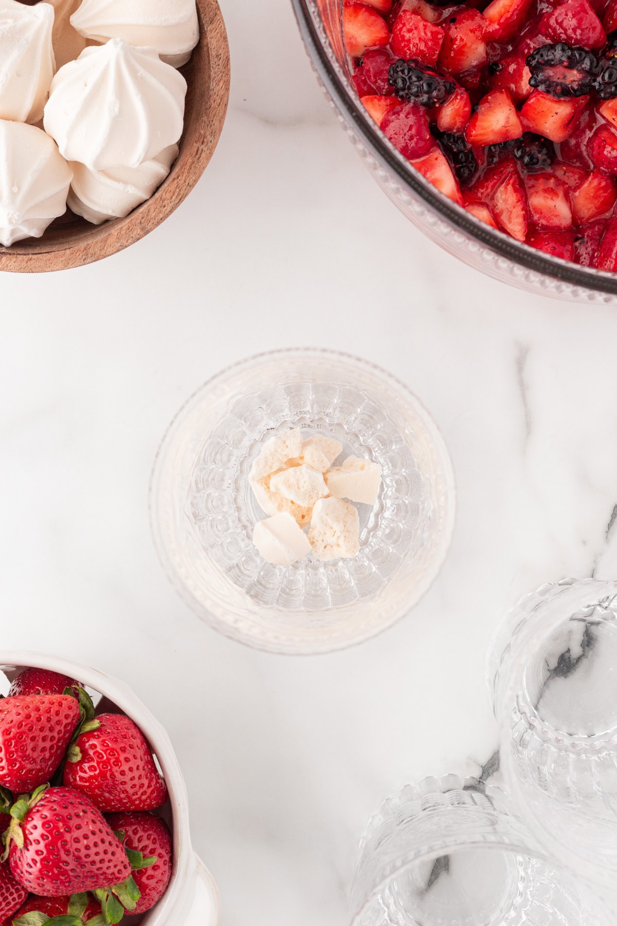 Meringues in bottom of glass. 