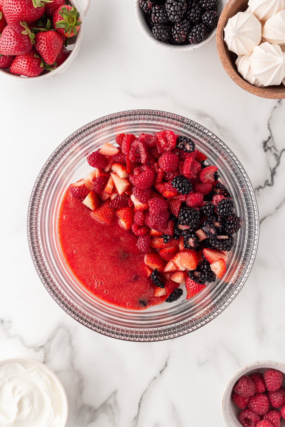 Berries and puree in a bowl. 