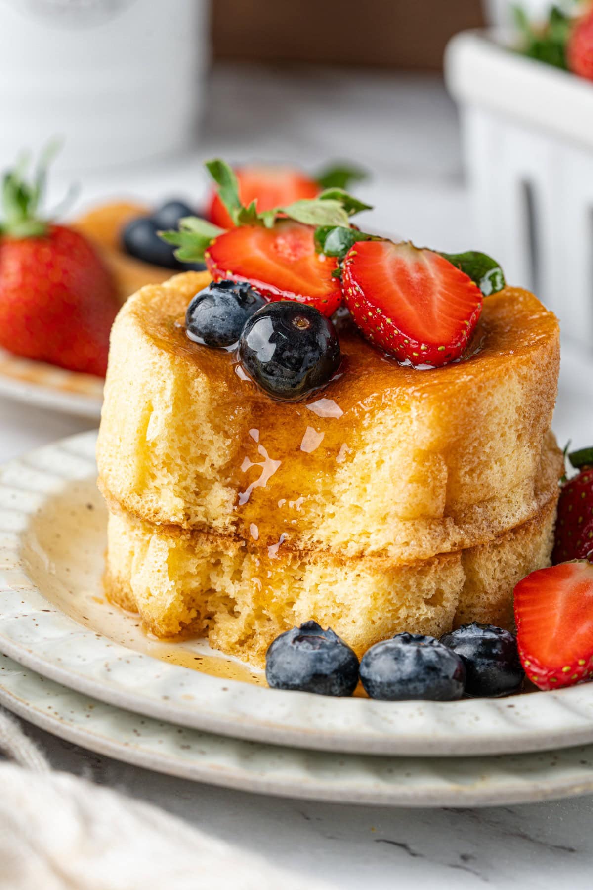 Forkful missing from pancakes.