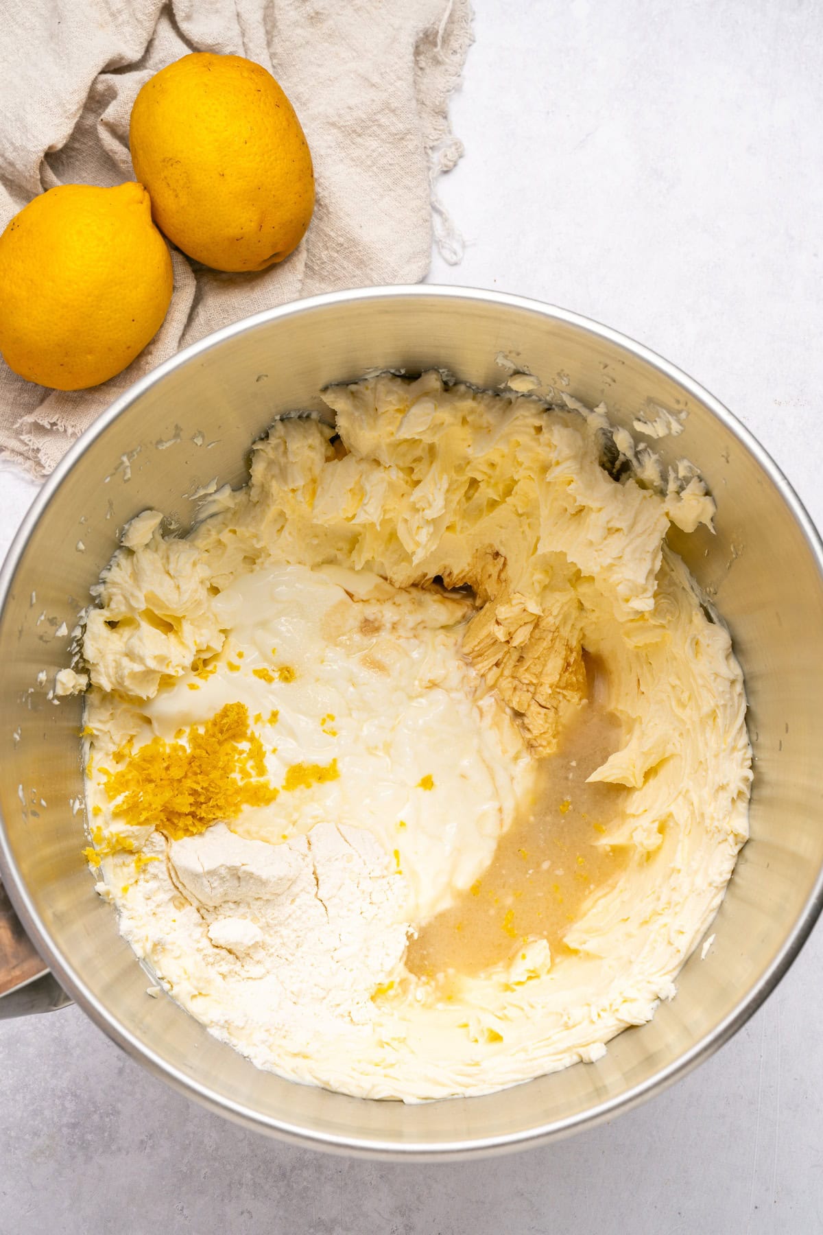 Mixing cheesecake filling ingredients.