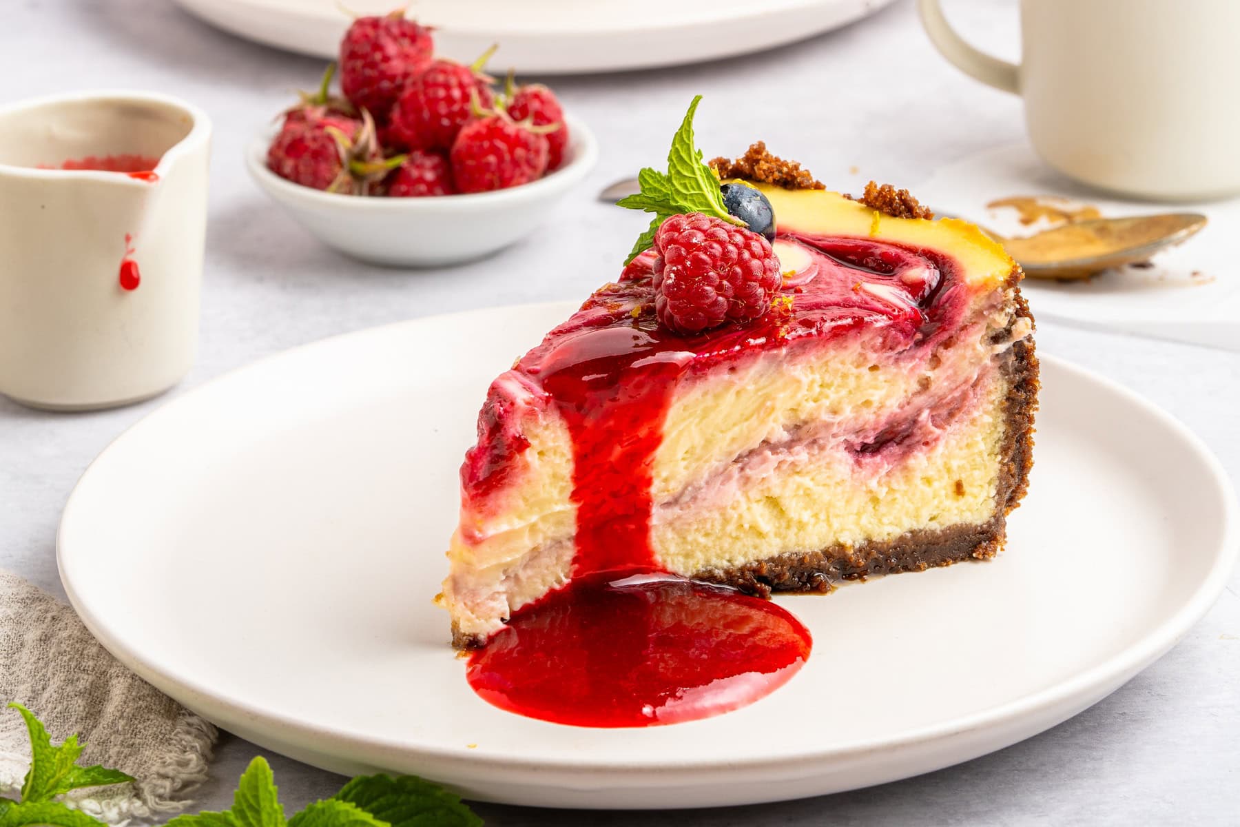Slice of raspberry cheesecake.