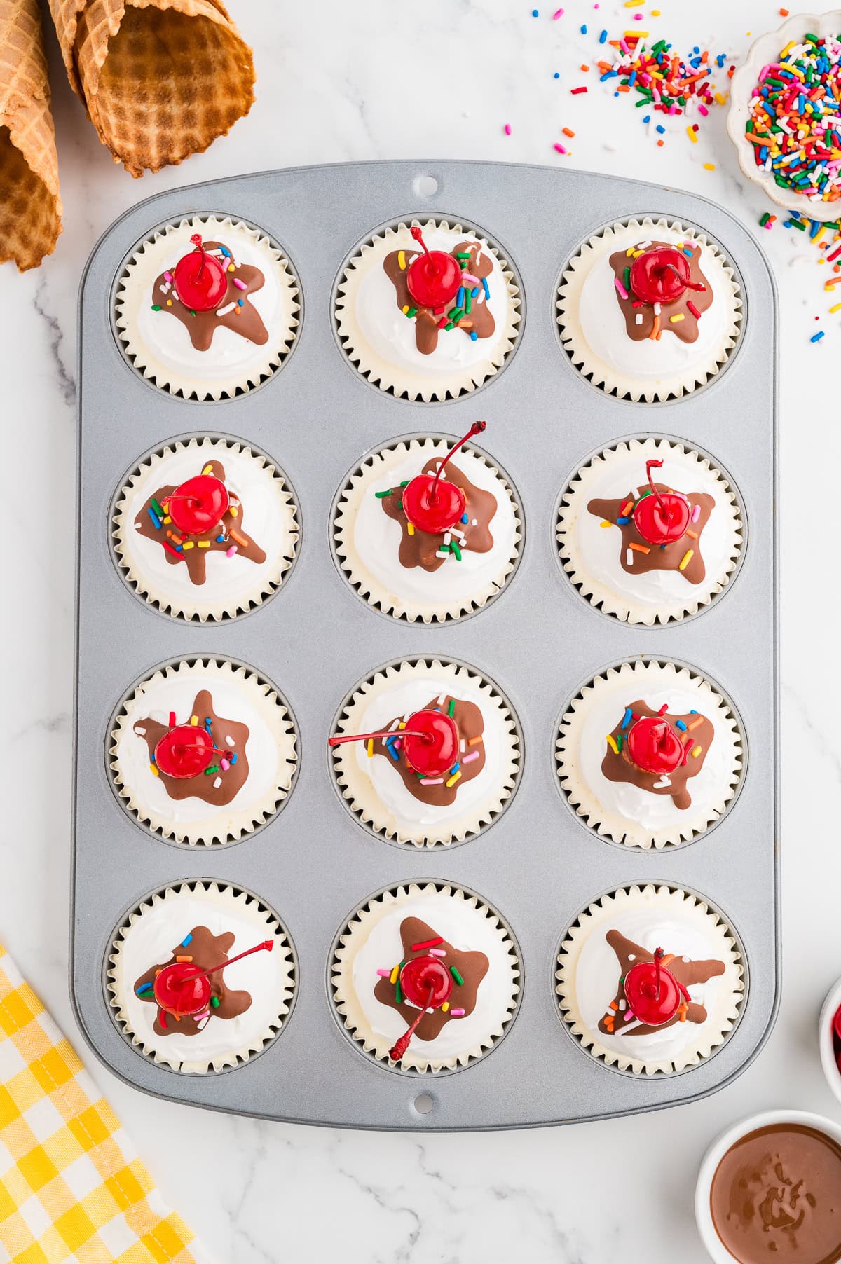 Small Ice Cream Cakes in a muffin tin. 