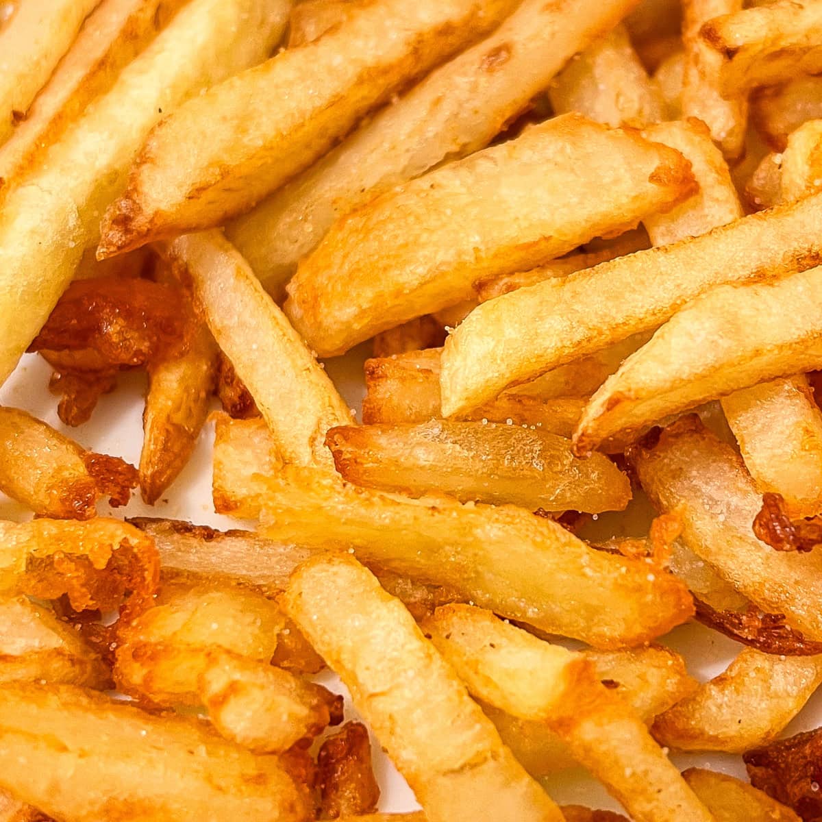 Close-up showing crispy fries. 