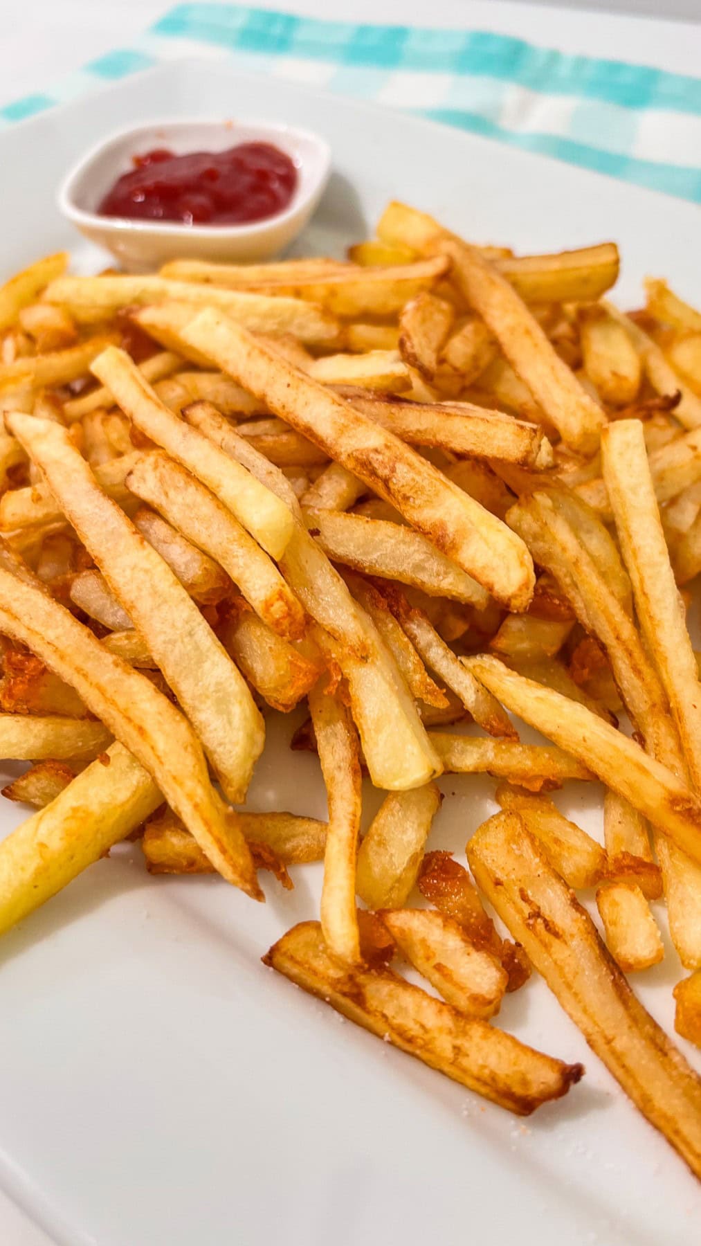 French Fried potatoes with ketchup. 