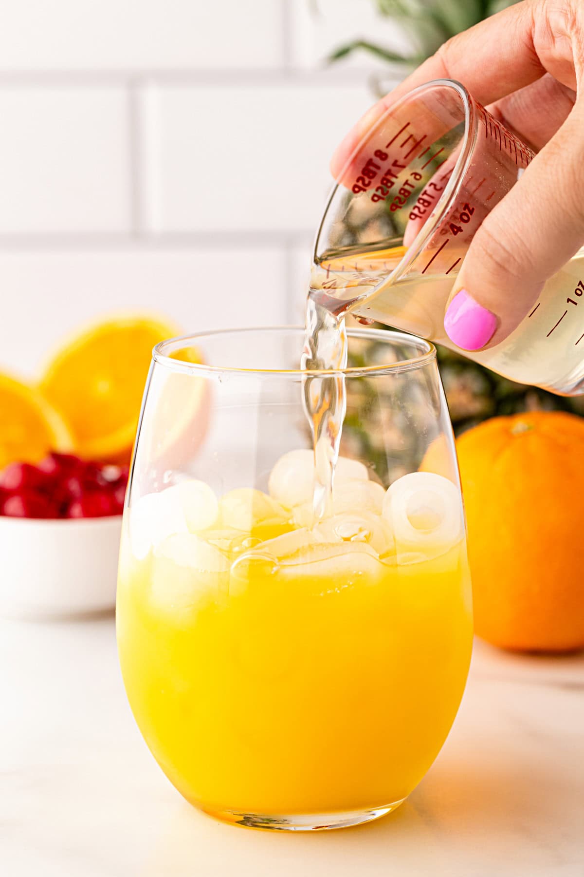 Adding in pineapple juice.