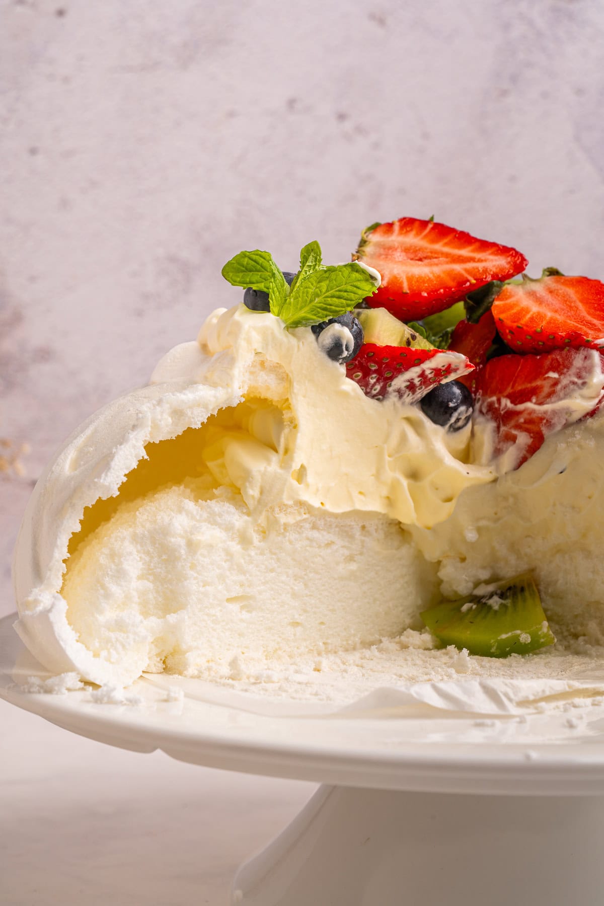 Showing the inside of the pavlova.
