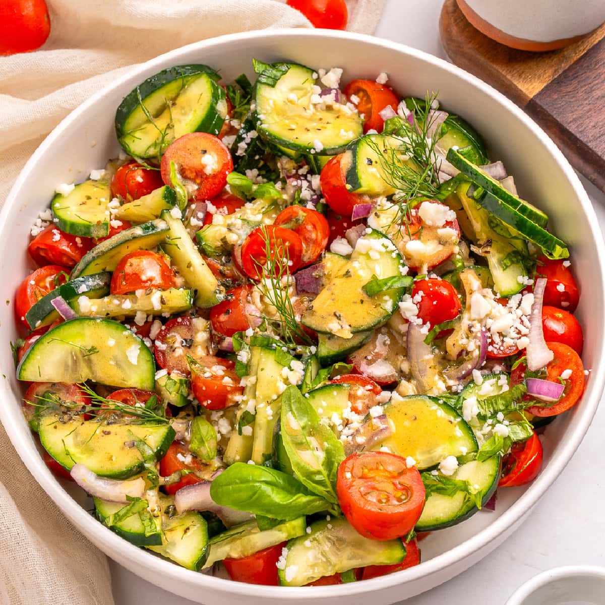 Tomato Cucumber Onion Salad dressed from overhead.