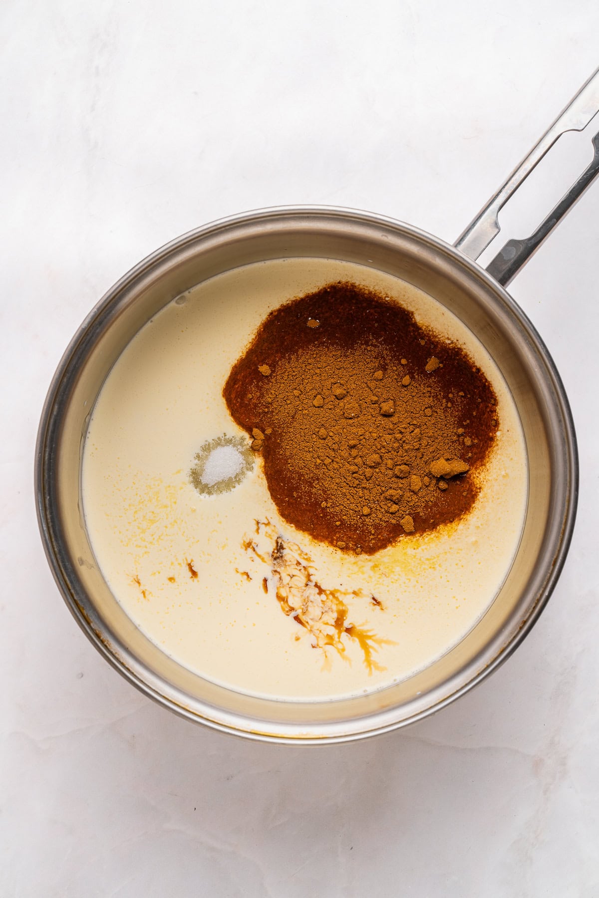 Mixing panna cotta ingredients.