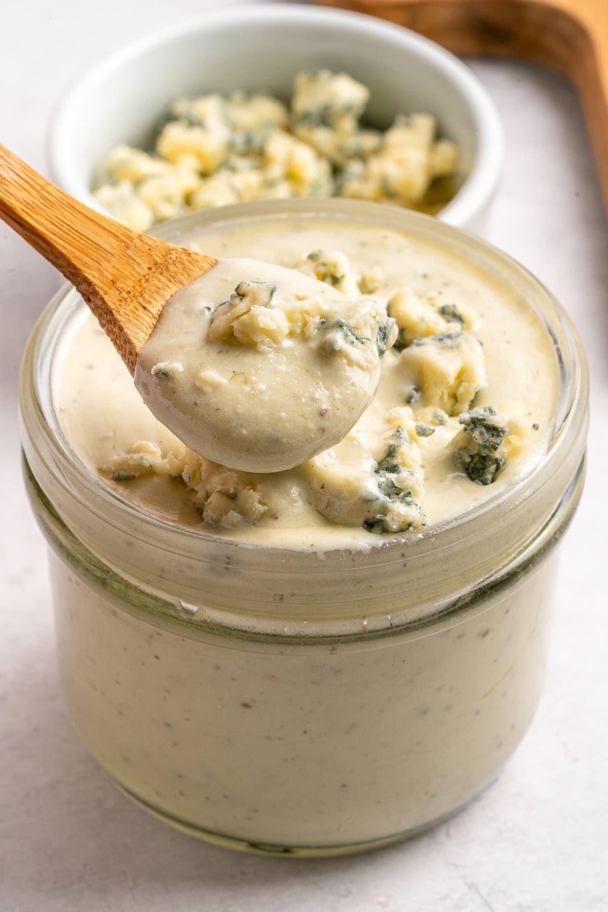 Blue cheese dressing in jar.