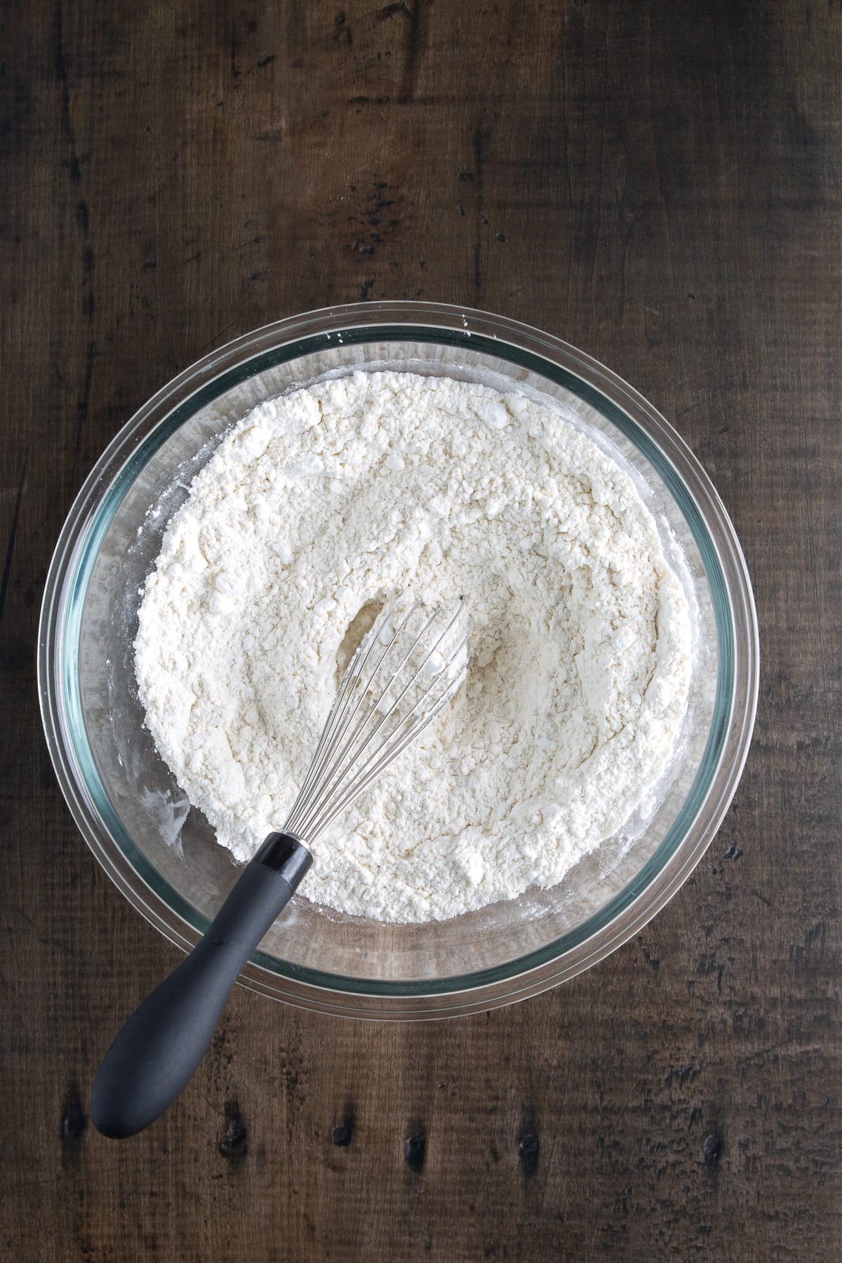Whisking dry ingredients.
