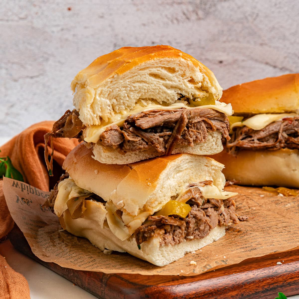 Close-up of stacked sandwiches. 