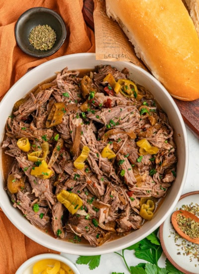Overhead of pulled beef in a bowl.