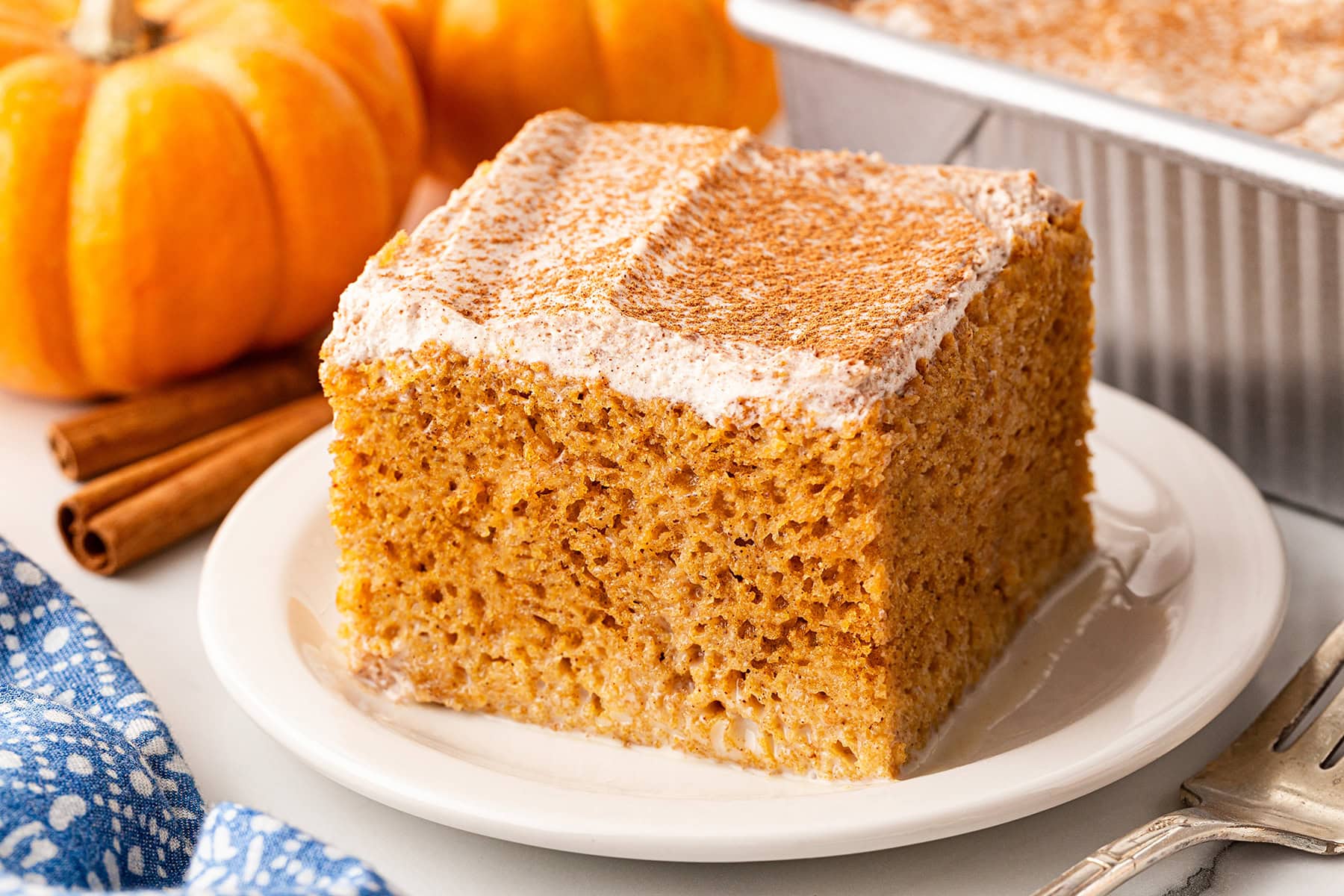 One square of cake on a plate.