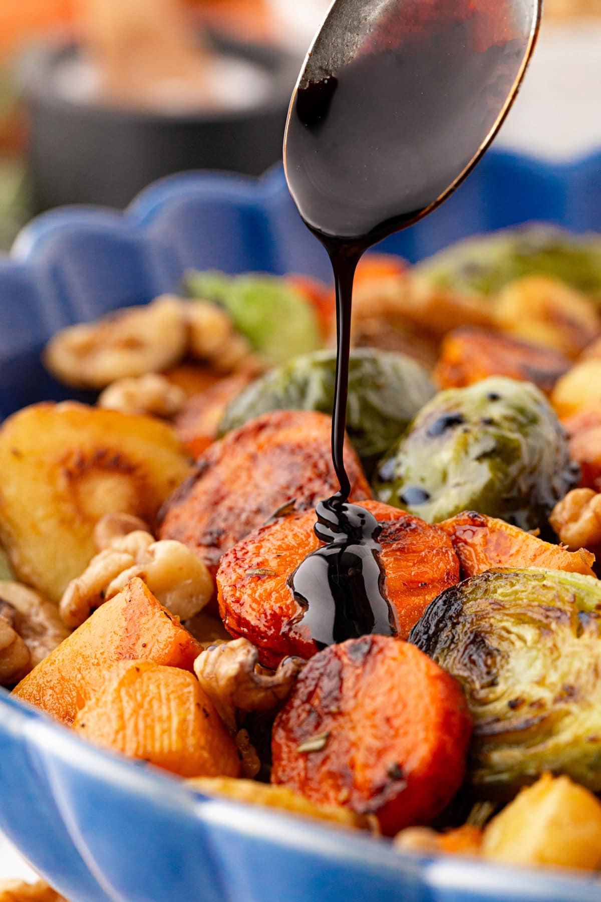 Drizzling on balsamic glaze.
