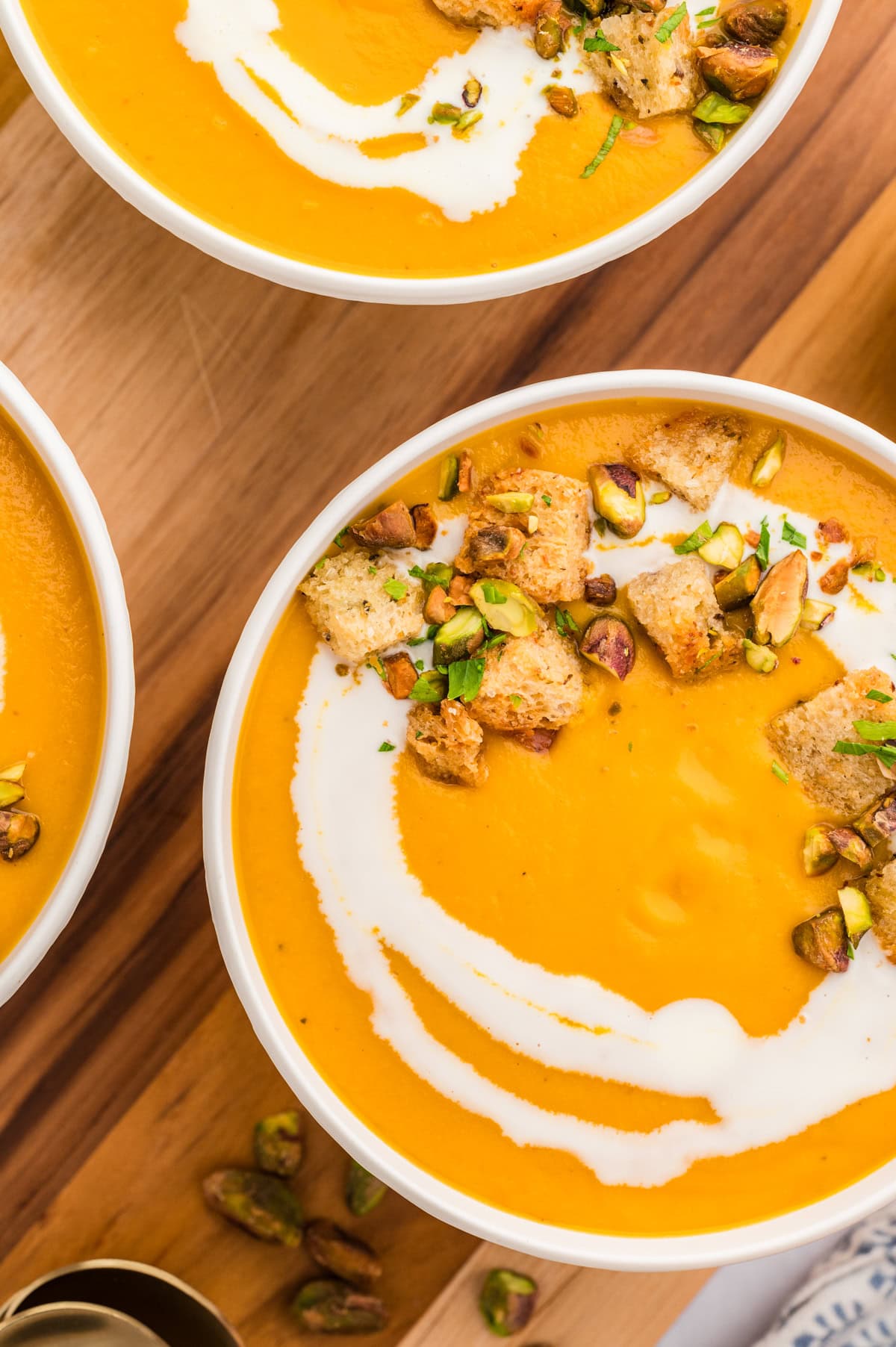 Sweet potato soup in bowls from overhead.