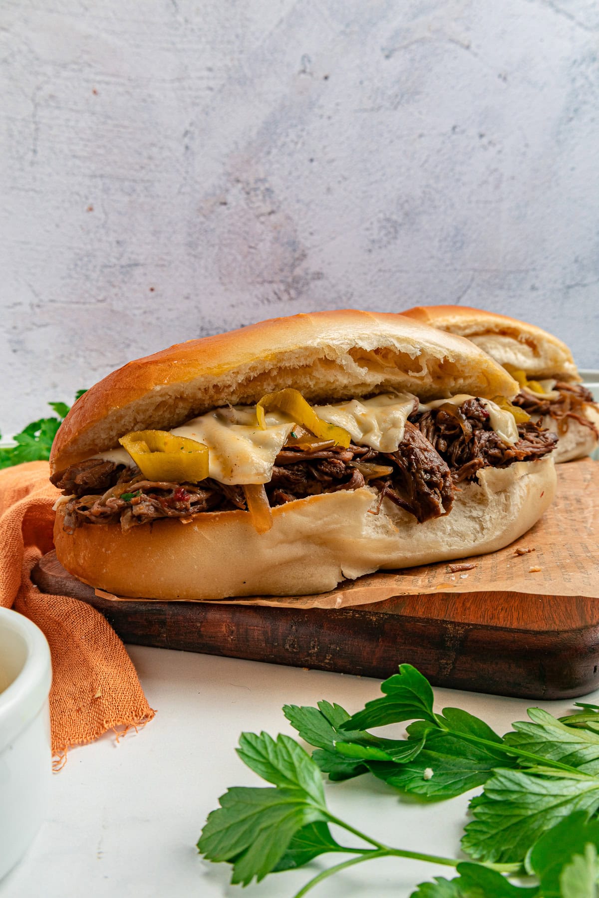 Italian beef sandwiches with melted provolone.